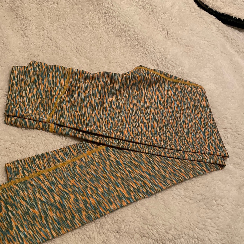 Green and yellow “Packers” leggings. Med